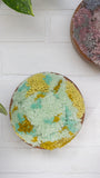 The Puff Collection | Round Teak Frame with Fiber Art in Chartreuse, Teal, Blue and Green