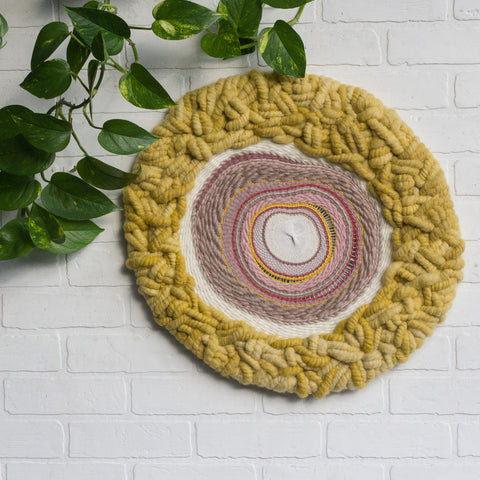 Circular Woven Wall Hanging in Pinks + Mustard